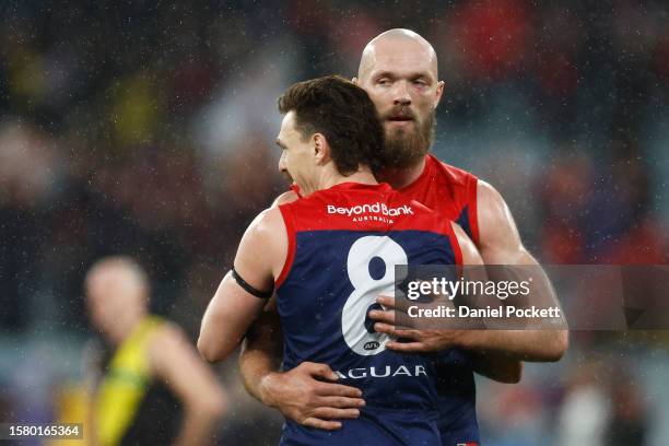 Max Gawn of the Demons and Jake Lever of the Demons celebrate on the final siren after winning the round 20 AFL match between Richmond Tigers and...