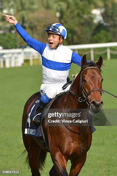 Yasunari Iwata riding Lord Kanaloa from Japan, celebrates after winning The Longines Hong Kong Sprint during the Hong Kong International Races at Sha...