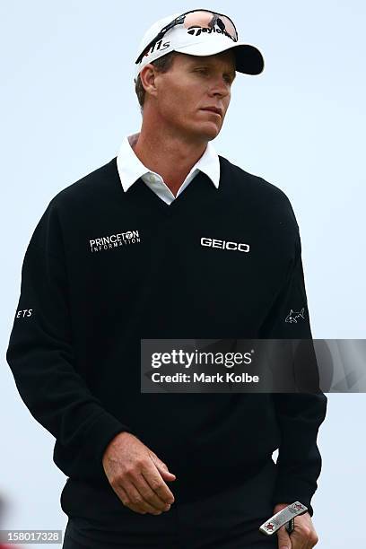 John Senden of Australia reacts during round four of the 2012 Australian Open at The Lakes Golf Club on December 9, 2012 in Sydney, Australia.