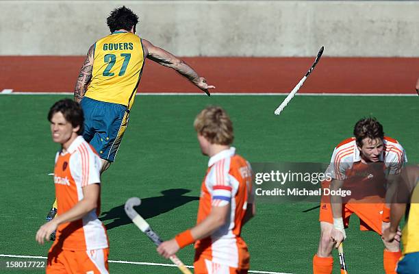 Kieran Govers of Australia celebrates scoring the winning goal in extra time with Mark Knowles to defeat the Netherlands in the final of the 2012...