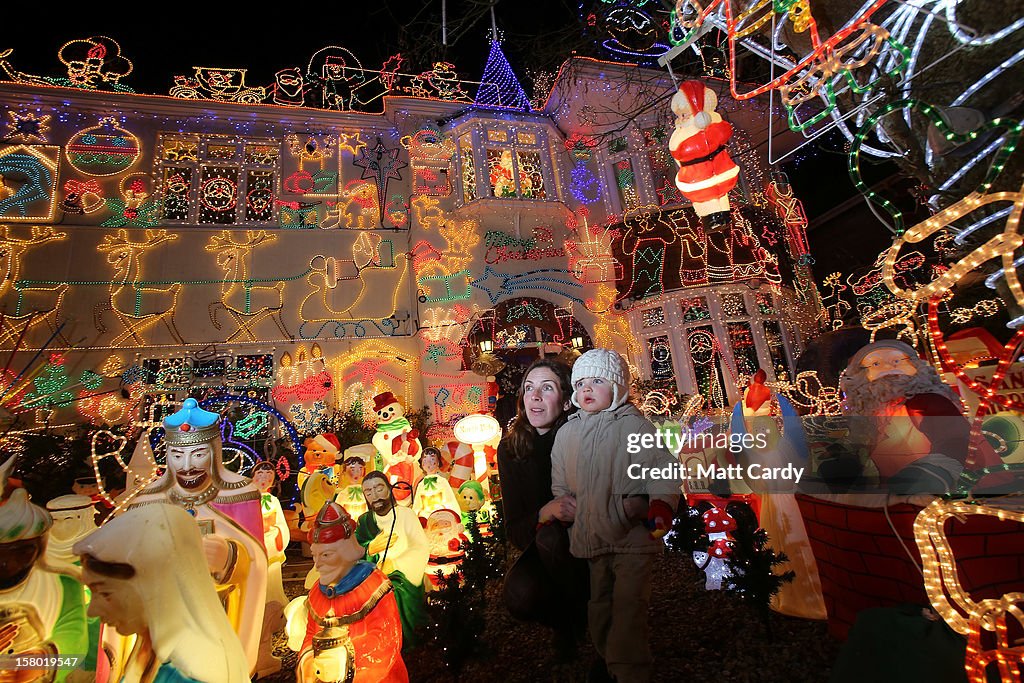 Homeowners Decorate Their Houses For Christmas