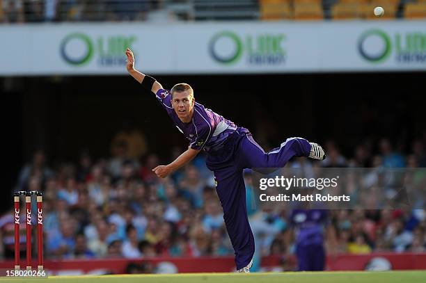 Xavier Doherty of the Hurricanes bowls during the Big Bash League match between the Brisbane Heat and the Hobart Hurricanes at The Gabba on December...