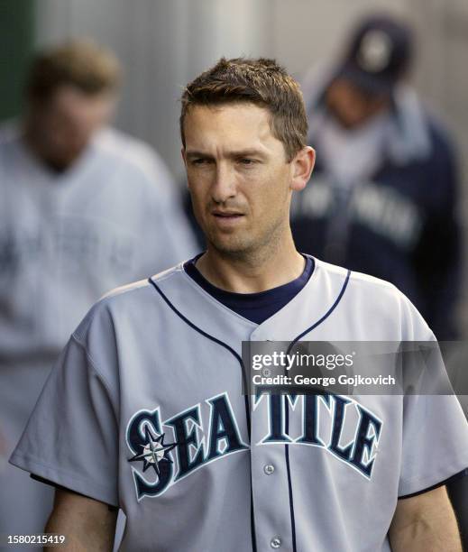 John Olerud of the Seattle Mariners looks on from the dugout during a game against the Pittsburgh Pirates at PNC Park on June 19, 2004 in Pittsburgh,...