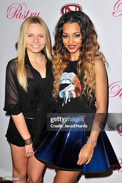 Alli Simpson and Jessica Jarrell arrive at Pastry Shoes "Skate & Donate" benefitting Toys For Tots on December 8, 2012 in Glendale, California.