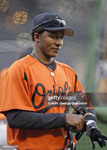 Napoleon Calzado of the Baltimore Orioles looks on from the field during batting practice before a game against the Pittsburgh Pirates at PNC Park on...