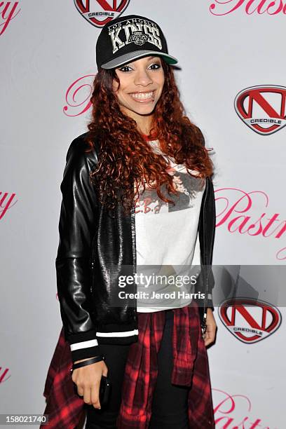 Recording artist E.B. Wright arrives at Pastry Shoes "Skate & Donate" benefitting Toys For Tots on December 8, 2012 in Glendale, California.