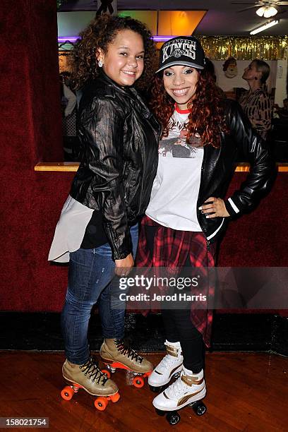 Rachel Crow and E.B. Wright arrive at Pastry Shoes "Skate & Donate" benefitting Toys For Tots on December 8, 2012 in Glendale, California.