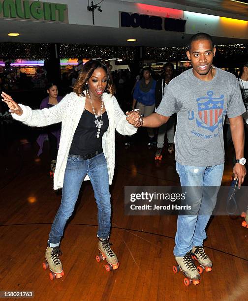 Estelle and guest rollerskate at Pastry Shoes "Skate & Donate" benefitting Toys For Tots on December 8, 2012 in Glendale, California.