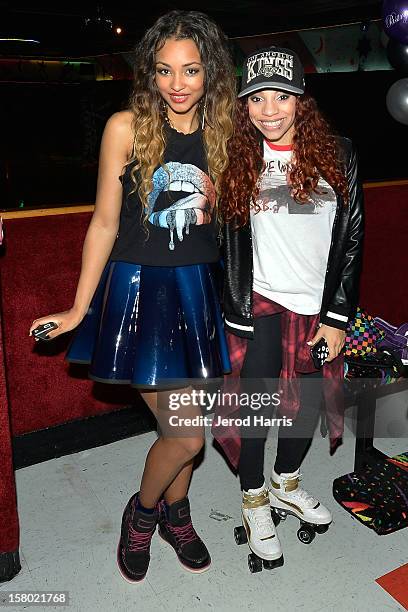 Jessica Jarrell and E.B. Wright attend Pastry Shoes "Skate & Donate" benefitting Toys For Tots on December 8, 2012 in Glendale, California.