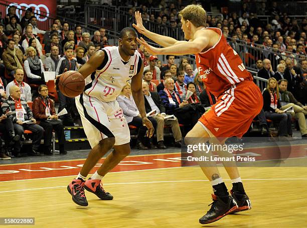 Jan-Hendrik Jagla of Muenchen blocks Patrick Ewing Jr. Of Bonn during the Beko Basketball match between FC Bayern Muenchen and Telekom Baskets Bonn...