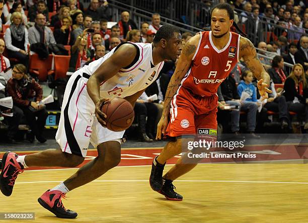 Chevon Troutman of Muenchen challenges Patrick Ewing Jr. Of Bonn during the Beko Basketball match between FC Bayern Muenchen and Telekom Baskets Bonn...