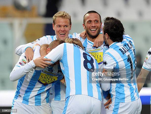 Elvis Abbruscato of Pescara celebrates with his team-mates after scoring the opening goal during the Serie A match between Pescara and Genoa CFC at...