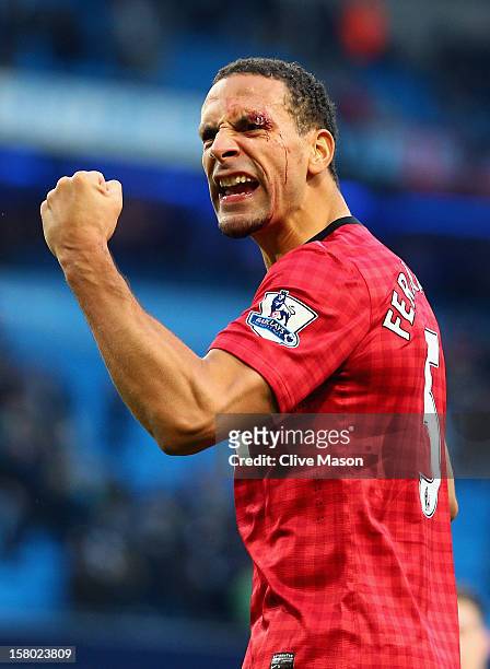 Rio Ferdinand of Manchester United celebrates at the end of the Barclays Premier League match between Manchester City and Manchester United at the...