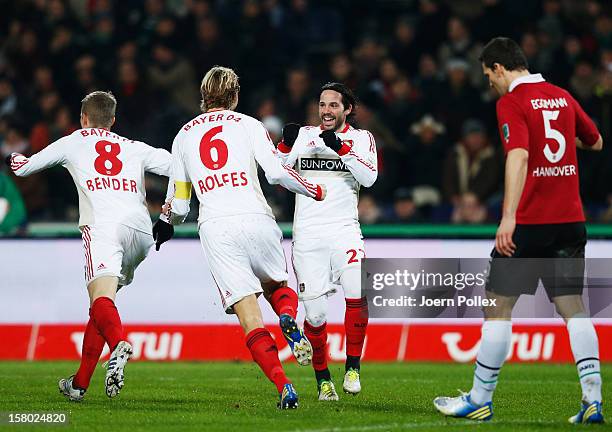 Gonzalo Castro of Leverkusen celebrates with his team mates after scoring his team's first goal during the Bundesliga match between Hannover 96 and...