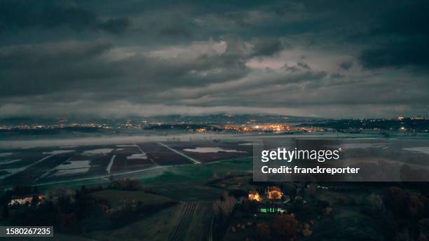 pond aerial view in winter in italy - aircraft point of view stock pictures, royalty-free photos & images