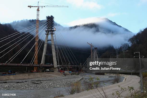 Construction work is seen on the train line that will connect the coastal cluster and the mountain cluster on December 9, 2012 in Sochi, Russia.