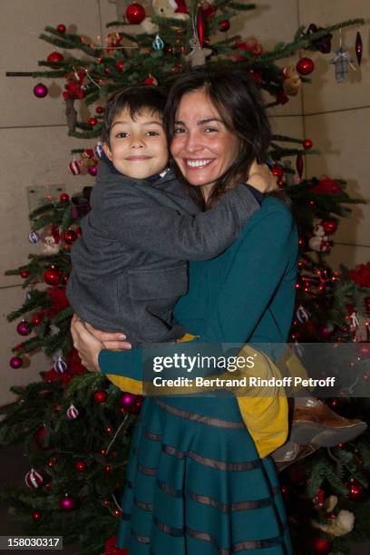 Ines Sastre and her son Diego pose before the Don Quichotte Ballet Hosted By 'Reve d'Enfants' Association and AROP at Opera Bastille on December 9,...