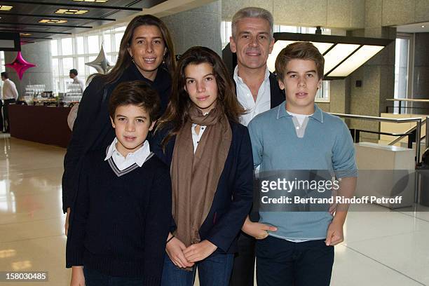 Christophe de Backer poses with his wife and children before the Don Quichotte Ballet Hosted By 'Reve d'Enfants' Association and AROP at Opera...