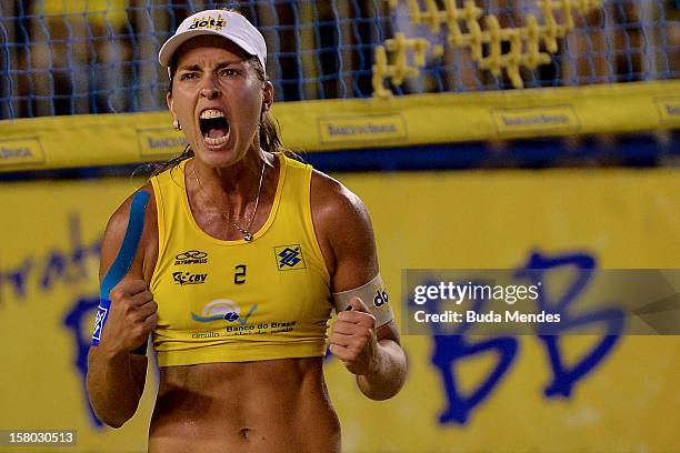 Lili celebrates victory during a beach volleyball match as part of the 6th stage of the season 2012/2013 Circuit Bank of Brazil at Copacabana Beach...