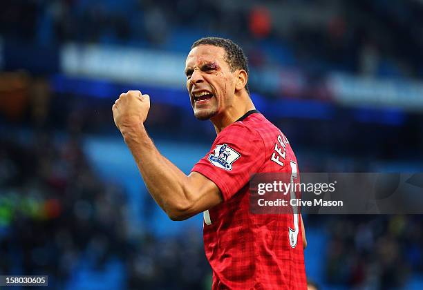 Rio Ferdinand of Manchester United celebrates at the end of the Barclays Premier League match between Manchester City and Manchester United at Etihad...