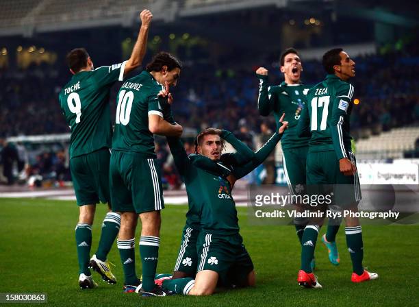 Charis Mavrias of Panathinaikos is celebrated by his team mates after scoring his team's first goal during the Superleague match between...