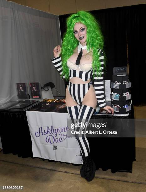 Ashlynne Dae dressed as Beetlejuice attends the 2023 Midsummer Scream held at Long Beach Convention & Entertainment Center on July 29, 2023 in Long...