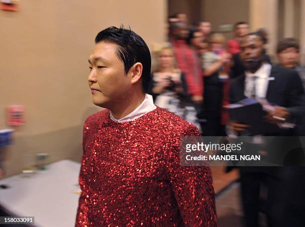 South Korean performer Psy is seen backstage before the taping of the "Christmas in Washington" television special on December 9, 2012 at the...