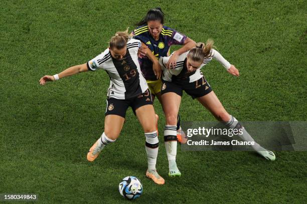 Lady Andrade of Colombia battles for the ball Klara Buehl and Jule Brand of Germany during the FIFA Women's World Cup Australia & New Zealand 2023...