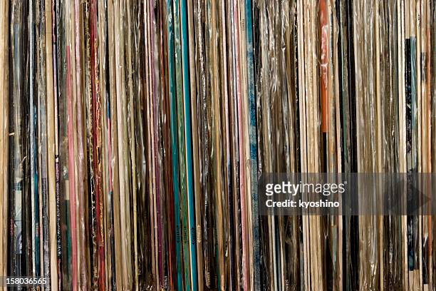 row of vinyl records background - album stock pictures, royalty-free photos & images