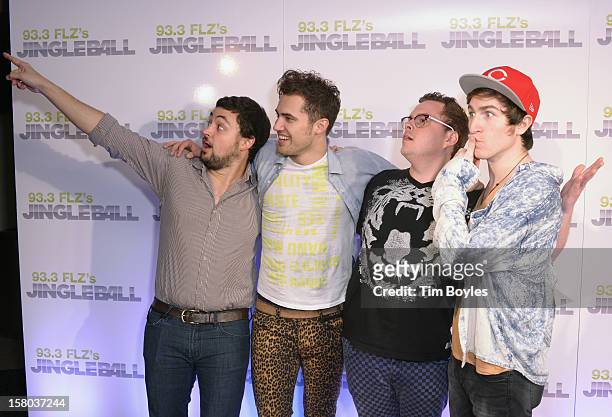 Musicians Eli Maiman, Kevin Ray, Sean Waugaman and Nicholas Petricca of Walk The Moon attend 93.3 FLZ's Jingle Ball 2012 at Tampa Bay Times Forum on...
