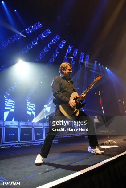 Rick Parfitt of Status Quo performs at Quofestive at the BIC on December 9, 2012 in Bournemouth, England.