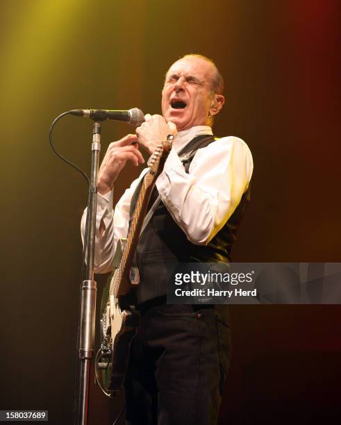 Francis Rossi of Status Quo performs at Quofestive at the BIC on December 9, 2012 in Bournemouth, England.