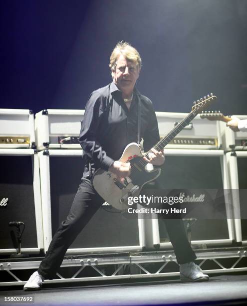 Rick Parfitt of Status Quo performs at Quofestive at the BIC on December 9, 2012 in Bournemouth, England.