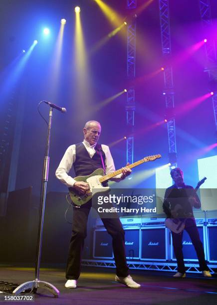 Francis Rossi and Rick Parfitt of Status Quo perform at Quofestive at the BIC on December 9, 2012 in Bournemouth, England.