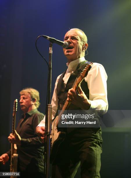 Rick Parfitt and Francis Rossi of Status Quo perform at Quofestive at the BIC on December 9, 2012 in Bournemouth, England.