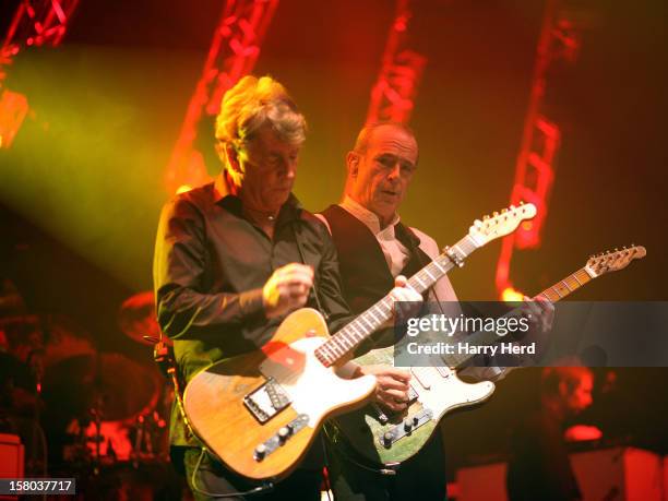 Rick Parfitt and Francis Rossi of Status Quo perform at Quofestive at the BIC on December 9, 2012 in Bournemouth, England.