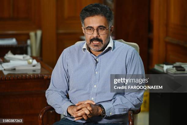 In this picture taken on July 21 Kamran Arshad, Managing Director of Ghazi Fabrics International, speaks during an interview with AFP in Lahore....