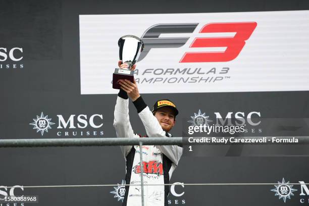Second placed Christian Mansell of Great Britain and Campos Racing celebrates on the podium during the Round 9:Spa-Francorchamps Feature race of the...