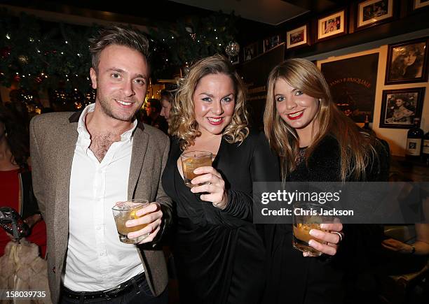 Guests enjoy Jack Daniels Single Barrel, 'Curtain Raiser' cocktails at the pre drinks for The Old Vic's 24 Hour Musicals Celebrity Gala 2012 at La...