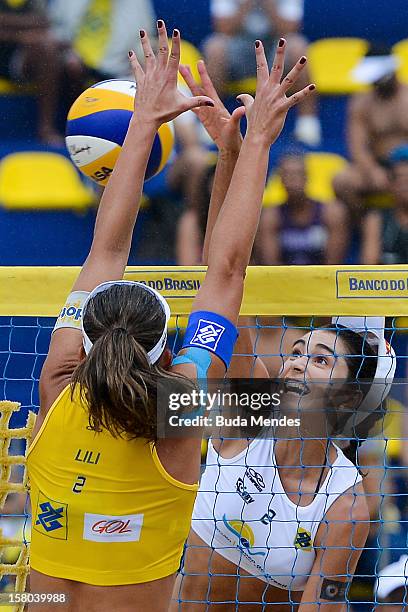 Lili and Carolina in action during a beach volleyball match against the 6th stage of the season 2012/2013 Circuit Bank of Brazil at Copacabana Beach...