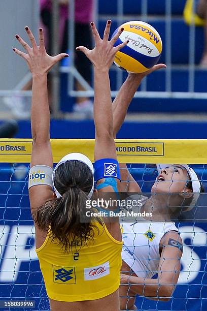 Lili and Maria Clara in action during a beach volleyball match against the 6th stage of the season 2012/2013 Circuit Bank of Brazil at Copacabana...
