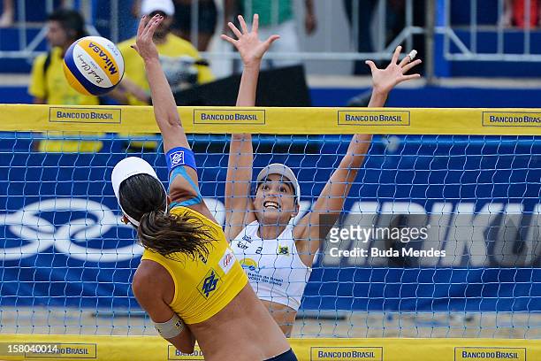 Lili and Carolina in action during a beach volleyball match against the 6th stage of the season 2012/2013 Circuit Bank of Brazil at Copacabana Beach...