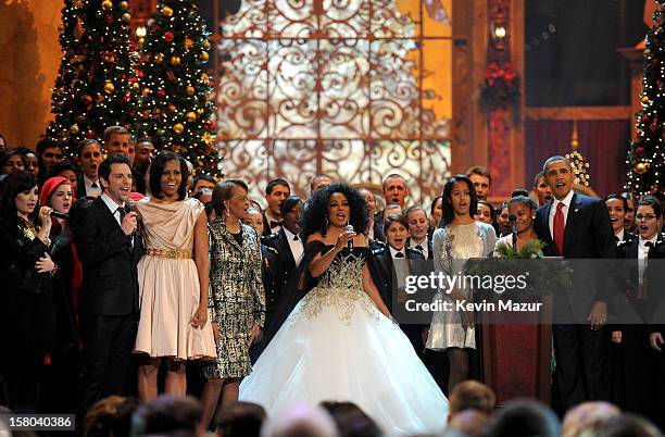 Singer Chris Mann, First Lady Michelle Obama, Marian Shields Robinson, singer Diana Ross, Malia Obama, Sasha Obama and U.S. President Barack Obama...