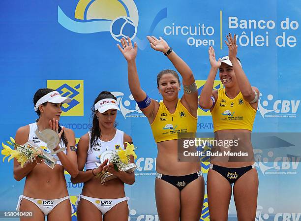 Carolina/Maria Clara second place and Rebecca/Lili first place, the third place during a beach volleyball match against the 6th stage of the season...