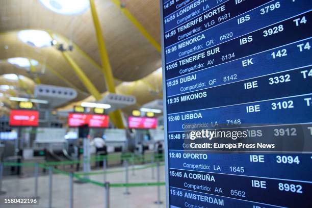 Information panel for flight departures in the check-in area of Terminal 4 at Adolfo Suarez Madrid-Barajas Airport, on August 1 in Madrid, Spain....