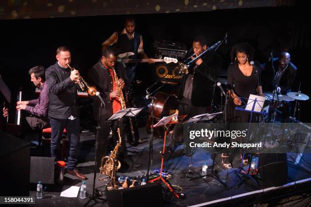 Alex Hawkins, Sean Corby, Jason Yarde, Neil Charles, Harry Brown, Valerie Etienne and Rod Youngs perform for the Jazz in the Round 2012 Christmas...