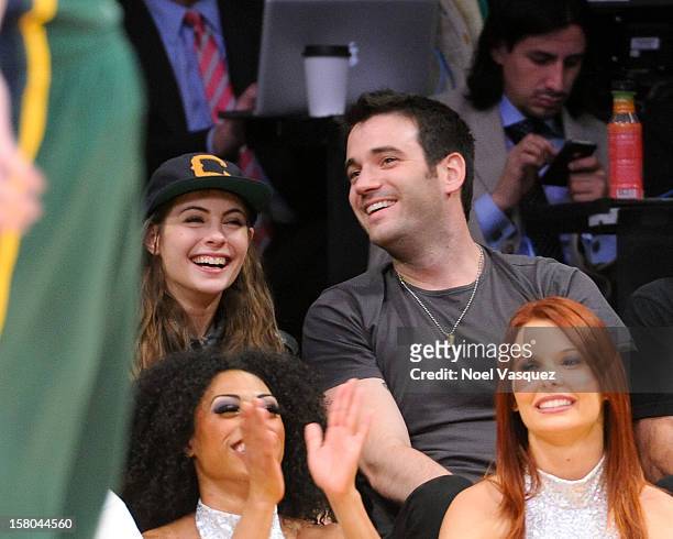 Willa Holland and Colin Donnell attend a basketball game between the Utah Jazz and the Los Angeles Lakers at Staples Center on December 9, 2012 in...