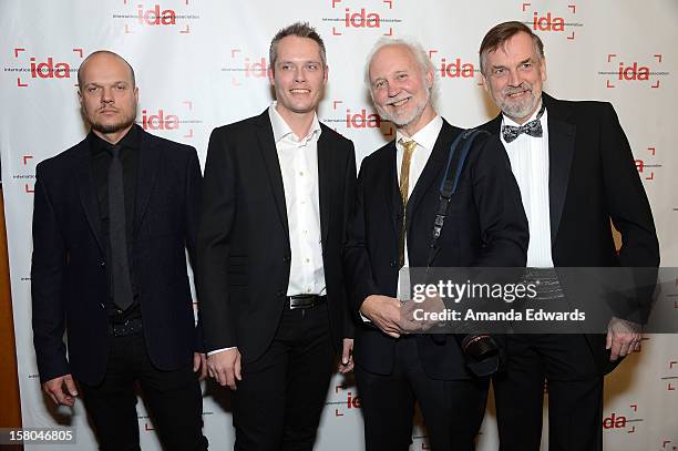 Composer Per-Henrik Maenpaa, editor Tell Aulin, director Peter Gerdehag and producer Malcolm Dixelius arrive at the International Documentary...