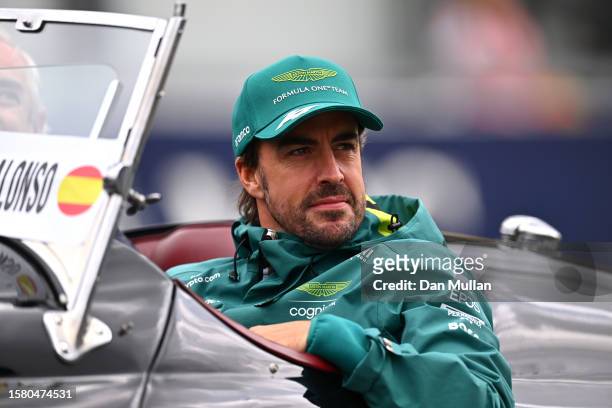 Fernando Alonso of Spain and Aston Martin F1 Team looks on from the drivers parade prior to the F1 Grand Prix of Belgium at Circuit de...