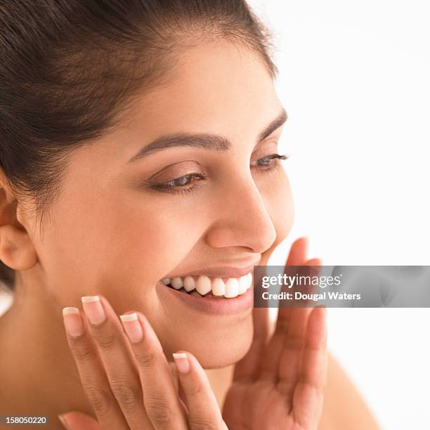 indian woman holding hands to face. - beautiful east indian women 個照片及圖片檔